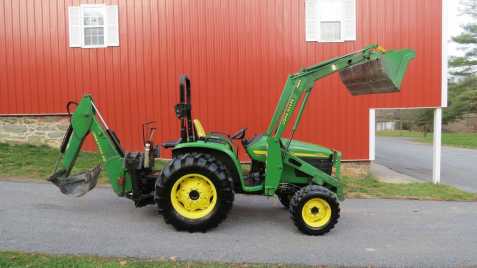 John Deere 4710 Traktor bagr